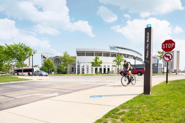 Photo of a bicycle user on campus