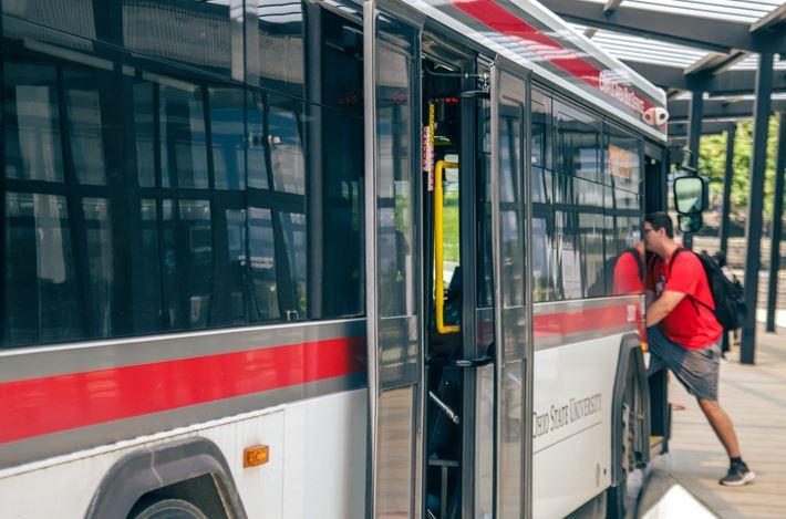 Passenger boarding CABS bus